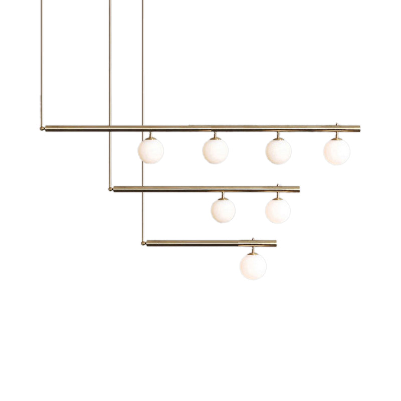 Linear Office Hallway Chandelier with Orbit Shade Metal 3/6/7 Lights Simple Modern Pendant Light in Brass Clearhalo 'Ceiling Lights' 'Chandeliers' 'Modern Chandeliers' 'Modern' Lighting' 189380