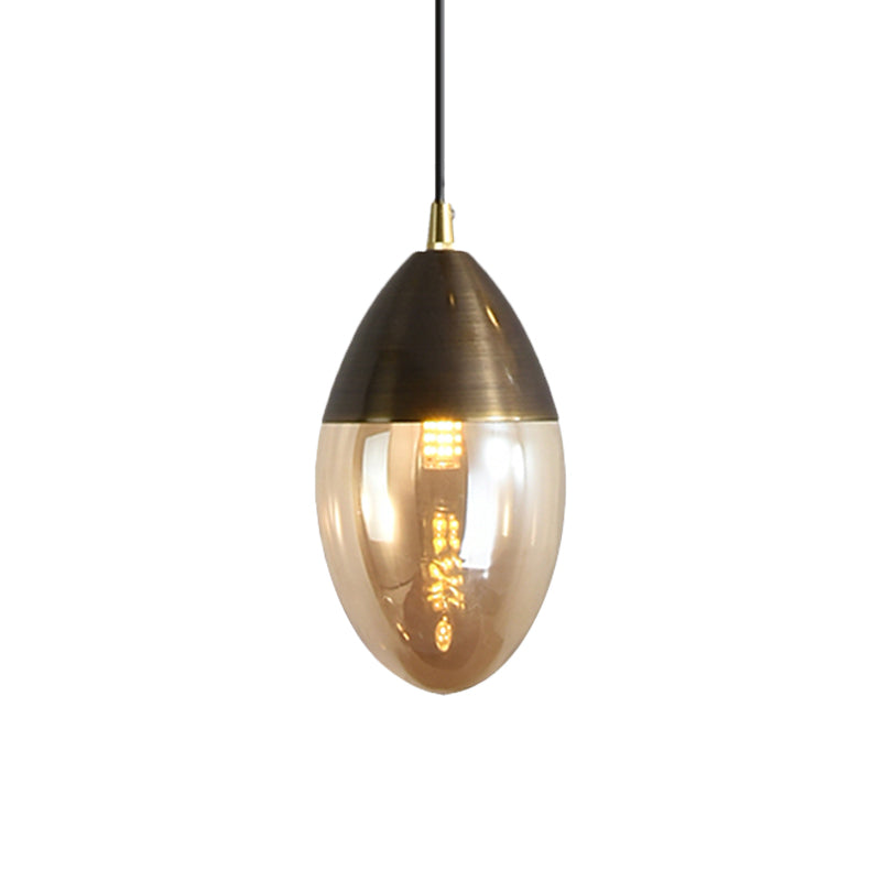 Post Modern Ellipsoid Suspension Pendant Clear/Amber Glass Led Dinging Room Ceiling Hung Light Amber Clearhalo 'Ceiling Lights' 'Glass shade' 'Glass' 'Modern Pendants' 'Modern' 'Pendant Lights' 'Pendants' Lighting' 1903089