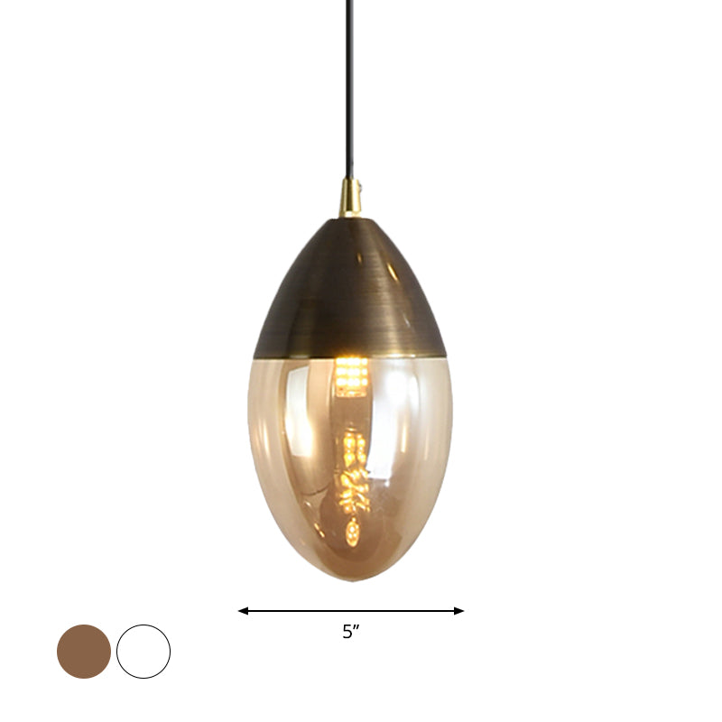 Post Modern Ellipsoid Suspension Pendant Clear/Amber Glass Led Dinging Room Ceiling Hung Light Clearhalo 'Ceiling Lights' 'Glass shade' 'Glass' 'Modern Pendants' 'Modern' 'Pendant Lights' 'Pendants' Lighting' 1903090