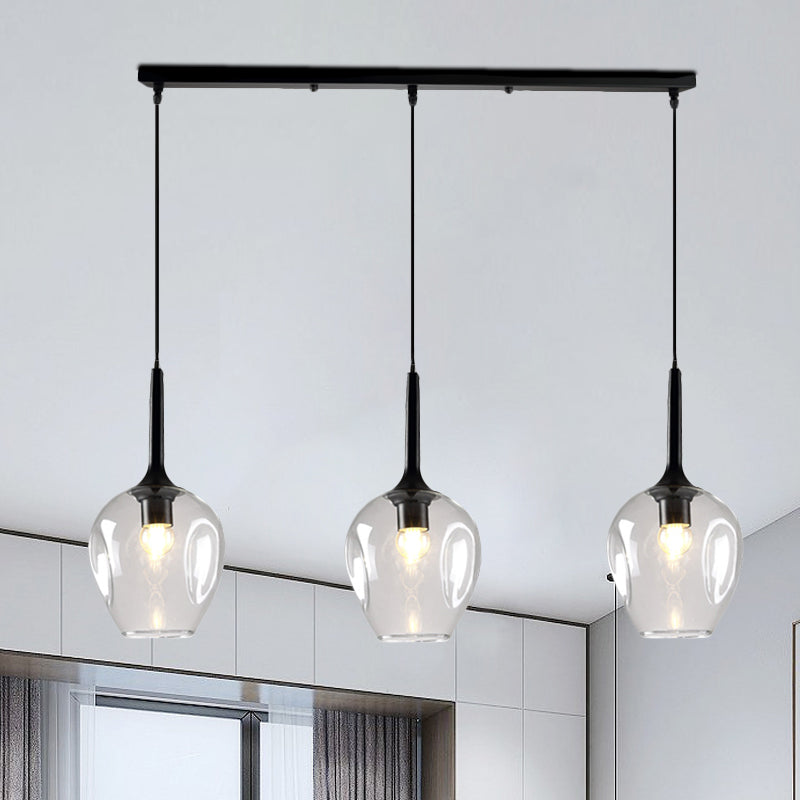 Tulip Cluster Pendant Lamp with Linear Design Modern Amber/Smoke/Blue Glass 3 Lights Black Ceiling Hung Light Clear Clearhalo 'Ceiling Lights' 'Chandeliers' 'Glass shade' 'Glass' 'Modern Pendants' 'Modern' 'Pendant Lights' 'Pendants' Lighting' 1903440