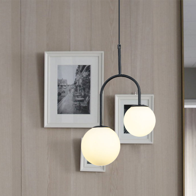 White Glass Global Hanging Pendant Light Modern 2 Heads Black/Gold Suspension Lamp with Arc Arm Clearhalo 'Ceiling Lights' 'Glass shade' 'Glass' 'Modern Pendants' 'Modern' 'Pendant Lights' 'Pendants' Lighting' 1903589