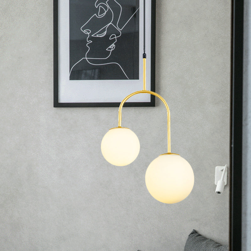 White Glass Global Hanging Pendant Light Modern 2 Heads Black/Gold Suspension Lamp with Arc Arm Gold Clearhalo 'Ceiling Lights' 'Glass shade' 'Glass' 'Modern Pendants' 'Modern' 'Pendant Lights' 'Pendants' Lighting' 1903593