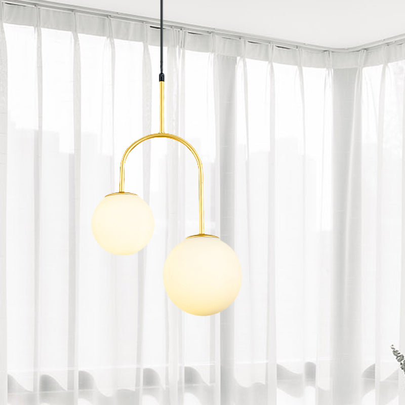 White Glass Global Hanging Pendant Light Modern 2 Heads Black/Gold Suspension Lamp with Arc Arm Clearhalo 'Ceiling Lights' 'Glass shade' 'Glass' 'Modern Pendants' 'Modern' 'Pendant Lights' 'Pendants' Lighting' 1903594