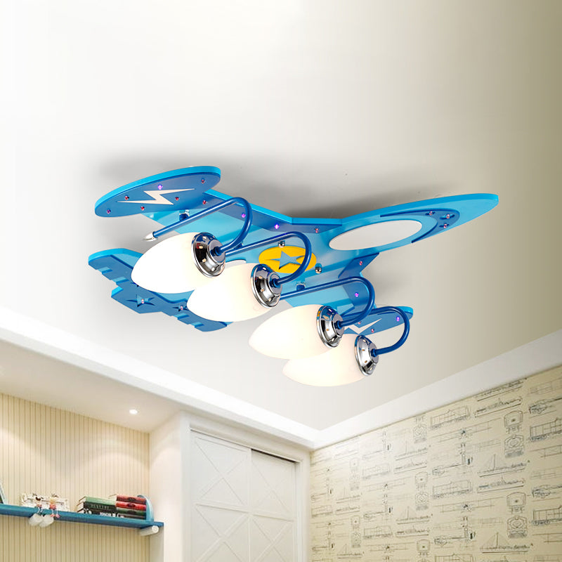 Kids Jet Aircraft Flush Light Wood 4 Heads Bedroom Flush Mount Ceiling Lighting in Blue with Oval Milk Glass Shade Clearhalo 'Ceiling Lights' 'Close To Ceiling Lights' 'Close to ceiling' 'Flush mount' Lighting' 1909330