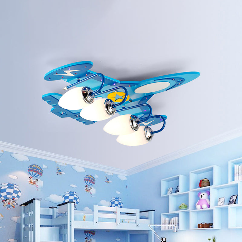 Kids Jet Aircraft Flush Light Wood 4 Heads Bedroom Flush Mount Ceiling Lighting in Blue with Oval Milk Glass Shade Clearhalo 'Ceiling Lights' 'Close To Ceiling Lights' 'Close to ceiling' 'Flush mount' Lighting' 1909331