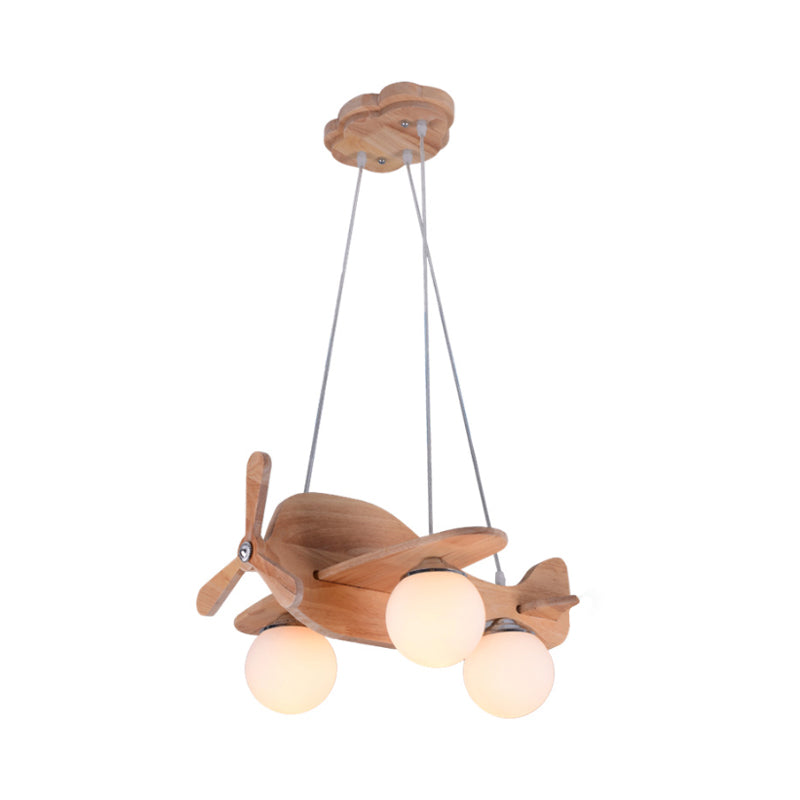 Creative Kids 3-Light Hanging Lamp Wood Plane Shaped Chandelier with Ball White Glass Shade Clearhalo 'Ceiling Lights' 'Chandeliers' Lighting' options 1909468