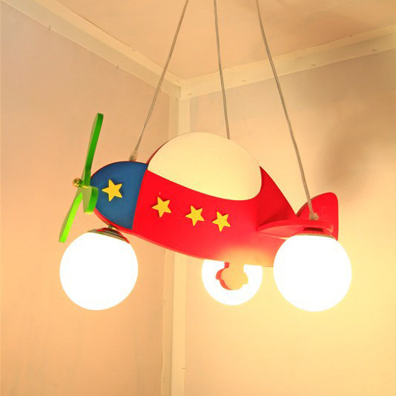 Cartoon Helicopter Chandelier Lighting Wooden 3 Bulbs Kids Room Hanging Light in Red with Ball Milk Glass Shade Clearhalo 'Ceiling Lights' 'Chandeliers' Lighting' options 1909504