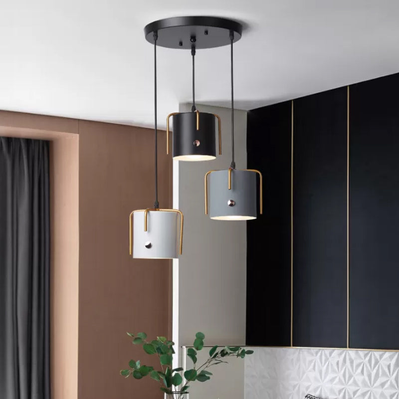 Cylinder/Bottle/Bell Hanging Lamp Kit Nordic Metal 3-Head Dining Room Suspension Pendant in Black Black E Clearhalo 'Ceiling Lights' 'Pendant Lights' 'Pendants' Lighting' 1912167_251fdb4a-579f-4711-877f-ab30eac27758