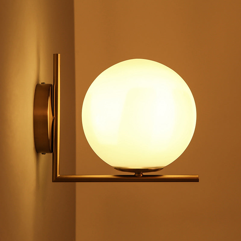 Frosted White Glass Ball Wall Light Minimalist 1 Head Gold Wall Lamp Fixture with Right Angle Arm, Warm/White Light Clearhalo 'Cast Iron' 'Glass' 'Industrial' 'Modern wall lights' 'Modern' 'Tiffany' 'Traditional wall lights' 'Wall Lamps & Sconces' 'Wall Lights' Lighting' 1936527