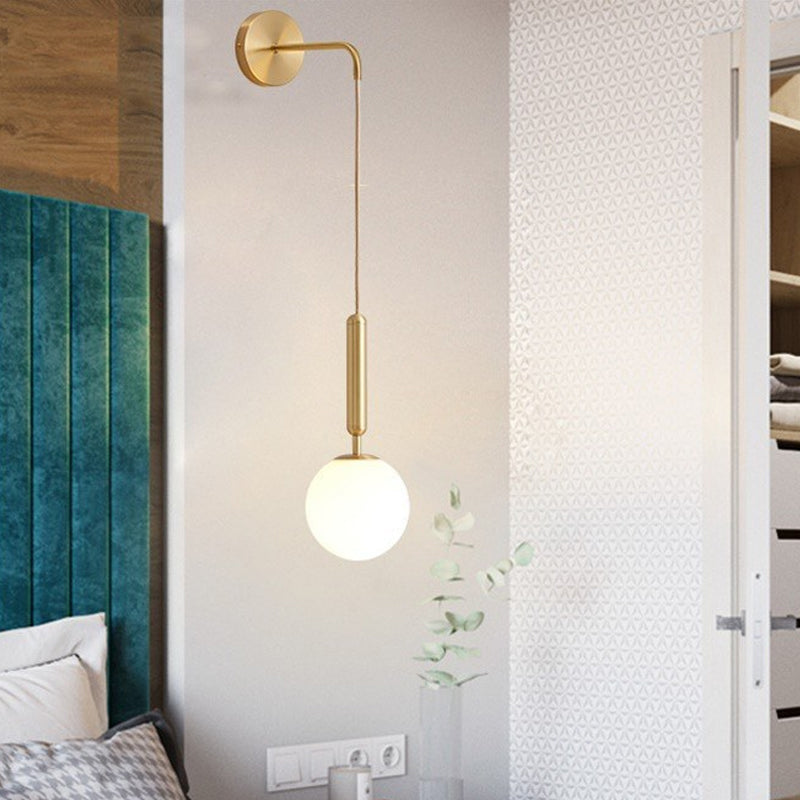 Spherical Bedside Wall Hanging Light Clear Water/White Glass Single Postmodern Wall Mounted Lamp in Black/Gold Clearhalo 'Cast Iron' 'Glass' 'Industrial' 'Modern wall lights' 'Modern' 'Tiffany' 'Traditional wall lights' 'Wall Lamps & Sconces' 'Wall Lights' Lighting' 1936635