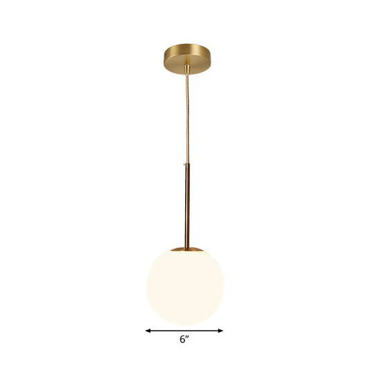 Simple Ball Shaped Drop Pendant White Glass 1 Light 6"/8"/10" Dia Bedroom Pendulum Light in Brass Clearhalo 'Ceiling Lights' 'Modern Pendants' 'Modern' 'Pendant Lights' 'Pendants' Lighting' 1936790