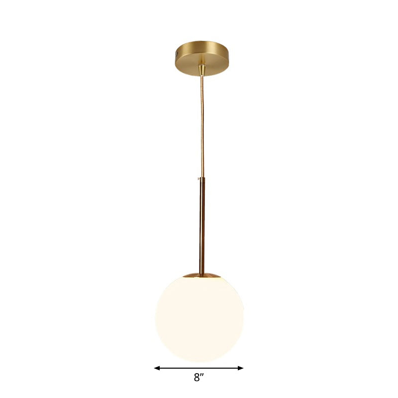 Simple Ball Shaped Drop Pendant White Glass 1 Light 6"/8"/10" Dia Bedroom Pendulum Light in Brass Clearhalo 'Ceiling Lights' 'Modern Pendants' 'Modern' 'Pendant Lights' 'Pendants' Lighting' 1936791