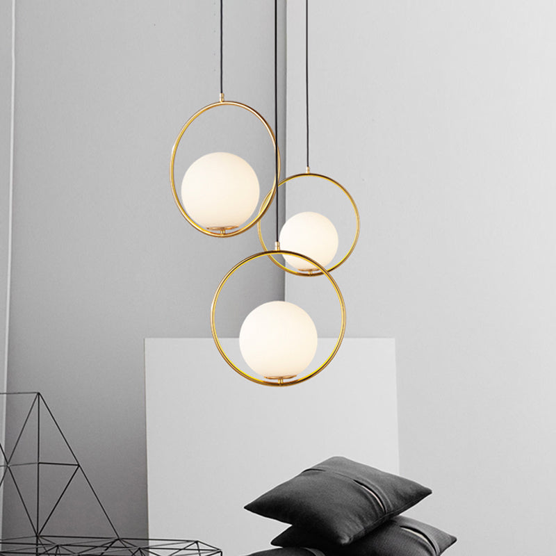 Black/Gold Sphere Hanging Lamp Postmodern Single Frosted White Glass Ringed Pendant Lighting Fixture, 10"/12"/14" W Clearhalo 'Ceiling Lights' 'Modern Pendants' 'Modern' 'Pendant Lights' 'Pendants' Lighting' 1936801