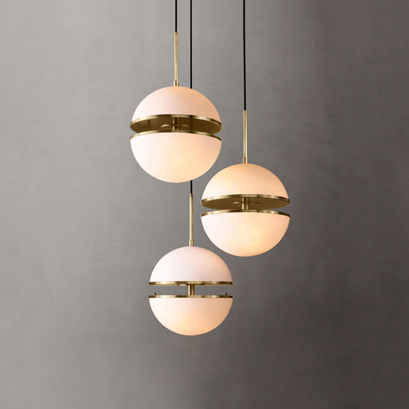 Sliced Sphere Gallery Hanging Lamp Frosted White Glass 8"/10"/12" W Single-Bulb Postmodern Ceiling Pendant in Brass Clearhalo 'Ceiling Lights' 'Modern Pendants' 'Modern' 'Pendant Lights' 'Pendants' Lighting' 1936875