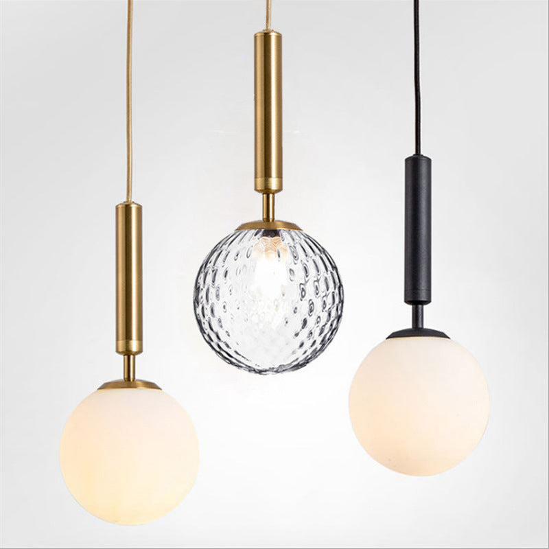 Ball Bedroom Down Lighting Pendant Clear Water/White Glass 1 Bulb Postmodern Hanging Light in Black/Gold Clearhalo 'Ceiling Lights' 'Modern Pendants' 'Modern' 'Pendant Lights' 'Pendants' Lighting' 1936910