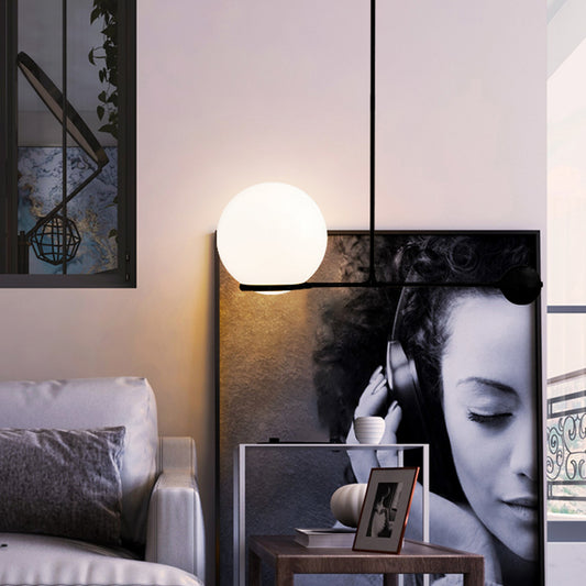 Globe Hotel Ceiling Suspension Lamp Frosted White Glass 1 Head Postmodern Drop Pendant with Lever Design in Black/Gold Black Clearhalo 'Ceiling Lights' 'Modern Pendants' 'Modern' 'Pendant Lights' 'Pendants' Lighting' 1937020