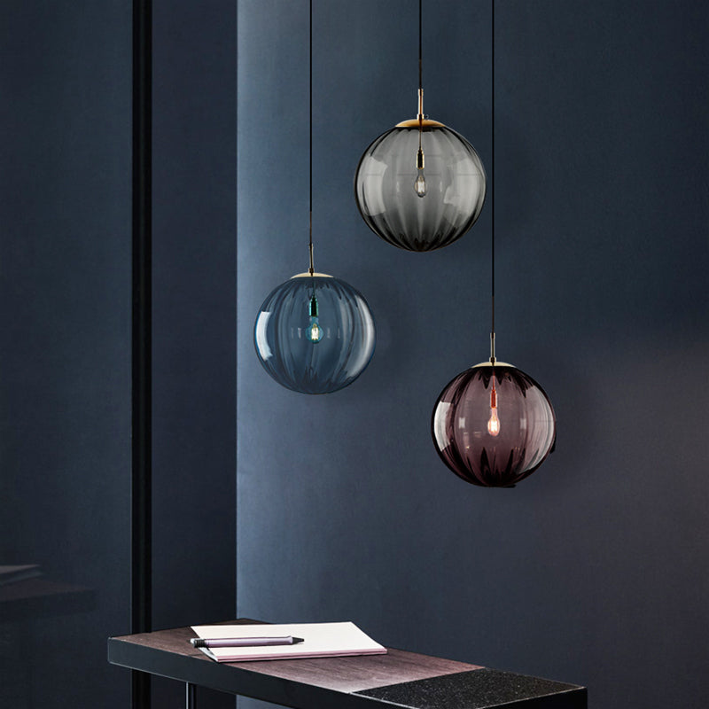 Globe Bedside Pendulum Light Blue/Smoke Grey/Purple Glass 1 Bulb Postmodern Ceiling Pendant Lamp in Black Clearhalo 'Ceiling Lights' 'Glass shade' 'Glass' 'Modern Pendants' 'Modern' 'Pendant Lights' 'Pendants' Lighting' 1937123