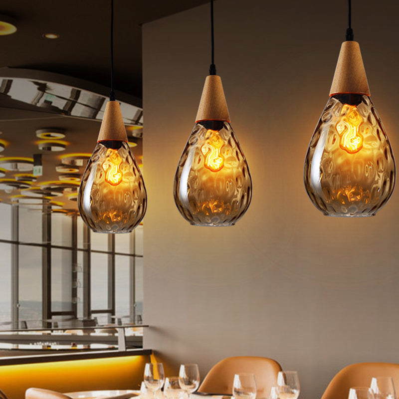 Wood Teardrop Pendant Light Fixture Modern 6"/8" Wide 1 Head Amber Water Glass Hanging Lamp for Restaurant Amber 6" Clearhalo 'Ceiling Lights' 'Glass shade' 'Glass' 'Modern Pendants' 'Modern' 'Pendant Lights' 'Pendants' Lighting' 1937149