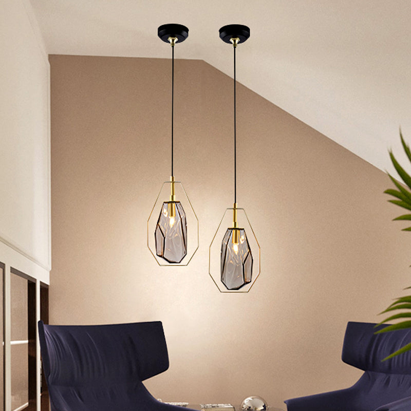 Gem Amber/Smoke Grey Glass Hanging Lamp Postmodernist 1 Light Brass Ceiling Pendant with Heptagon Frame Clearhalo 'Ceiling Lights' 'Glass shade' 'Glass' 'Modern Pendants' 'Modern' 'Pendant Lights' 'Pendants' Lighting' 1937306