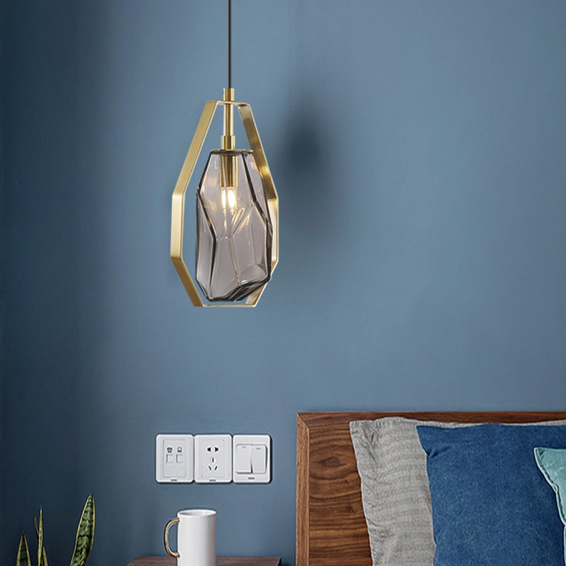 Gem Amber/Smoke Grey Glass Hanging Lamp Postmodernist 1 Light Brass Ceiling Pendant with Heptagon Frame Clearhalo 'Ceiling Lights' 'Glass shade' 'Glass' 'Modern Pendants' 'Modern' 'Pendant Lights' 'Pendants' Lighting' 1937307