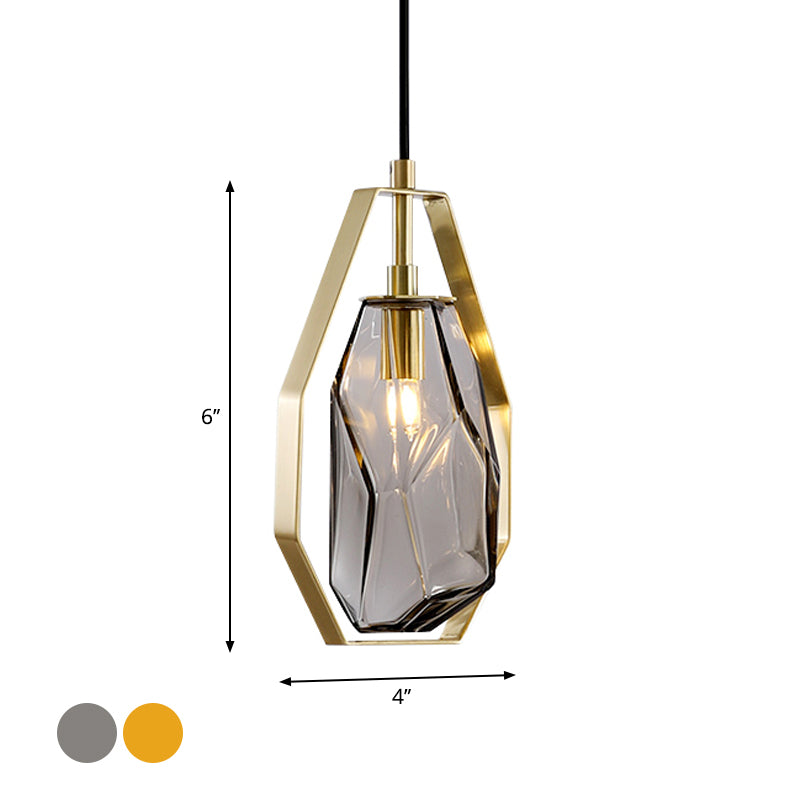 Gem Amber/Smoke Grey Glass Hanging Lamp Postmodernist 1 Light Brass Ceiling Pendant with Heptagon Frame Clearhalo 'Ceiling Lights' 'Glass shade' 'Glass' 'Modern Pendants' 'Modern' 'Pendant Lights' 'Pendants' Lighting' 1937309