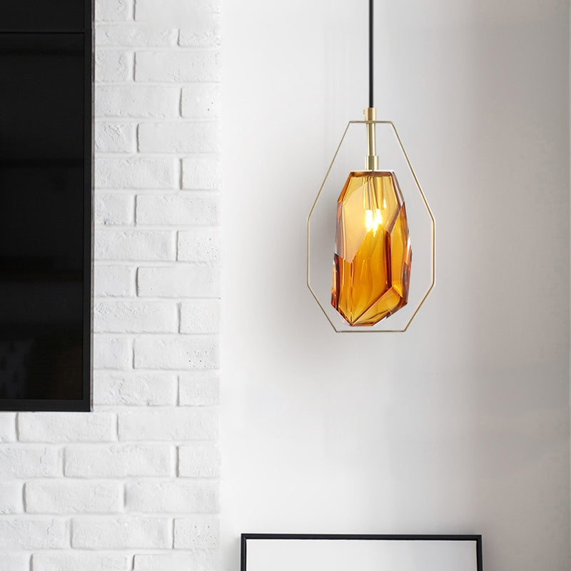 Gem Amber/Smoke Grey Glass Hanging Lamp Postmodernist 1 Light Brass Ceiling Pendant with Heptagon Frame Clearhalo 'Ceiling Lights' 'Glass shade' 'Glass' 'Modern Pendants' 'Modern' 'Pendant Lights' 'Pendants' Lighting' 1937312