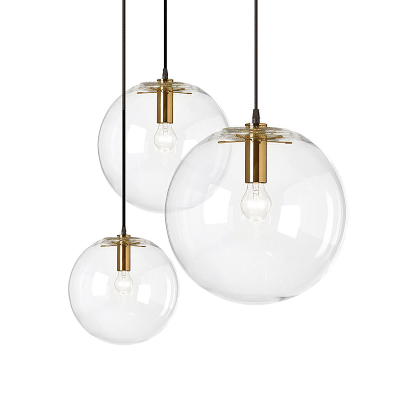 Brass Bubble Ball Pendant Lighting Minimalist 1-Light Clear Glass Ceiling Hang Lamp, 8"/12" Dia Gold Clearhalo 'Ceiling Lights' 'Glass shade' 'Glass' 'Modern Pendants' 'Modern' 'Pendant Lights' 'Pendants' Lighting' 1937323