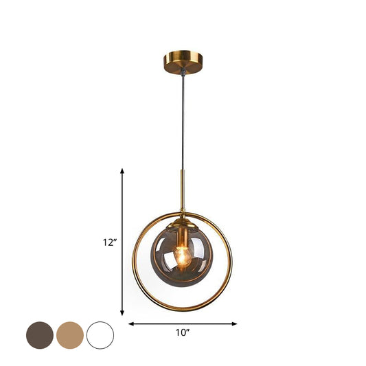 Globe Down Lighting Pendant Postmodern Clear/Amber/Smoke Grey Glass Single-Bulb Bedroom Suspension Light with Brass Ring Clearhalo 'Ceiling Lights' 'Glass shade' 'Glass' 'Modern Pendants' 'Modern' 'Pendant Lights' 'Pendants' Lighting' 1937401