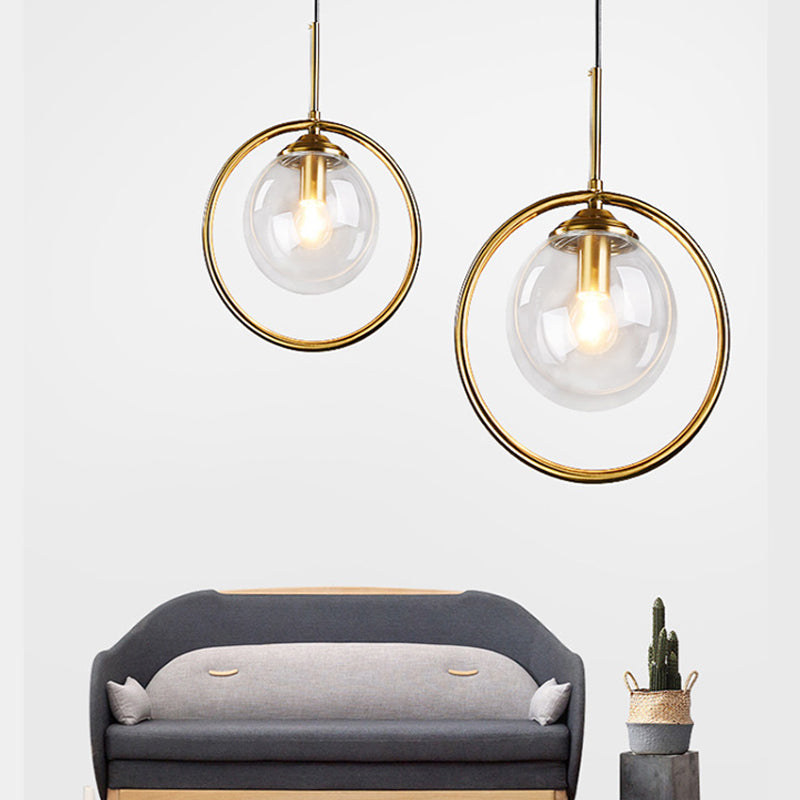 Globe Down Lighting Pendant Postmodern Clear/Amber/Smoke Grey Glass Single-Bulb Bedroom Suspension Light with Brass Ring Clearhalo 'Ceiling Lights' 'Glass shade' 'Glass' 'Modern Pendants' 'Modern' 'Pendant Lights' 'Pendants' Lighting' 1937407