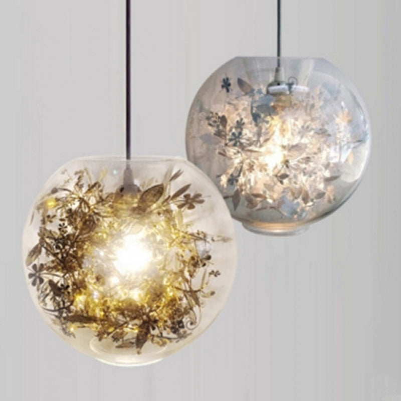Globe Clear Glass Pendulum Light Modern 1 Head Silver/Gold Ceiling Hang Lamp with Scattered Flower Decor Gold B Clearhalo 'Ceiling Lights' 'Glass shade' 'Glass' 'Modern Pendants' 'Modern' 'Pendant Lights' 'Pendants' Lighting' 1937439