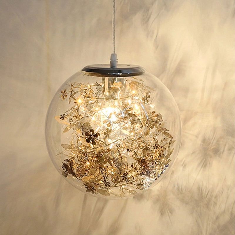 Globe Clear Glass Pendulum Light Modern 1 Head Silver/Gold Ceiling Hang Lamp with Scattered Flower Decor Clearhalo 'Ceiling Lights' 'Glass shade' 'Glass' 'Modern Pendants' 'Modern' 'Pendant Lights' 'Pendants' Lighting' 1937440