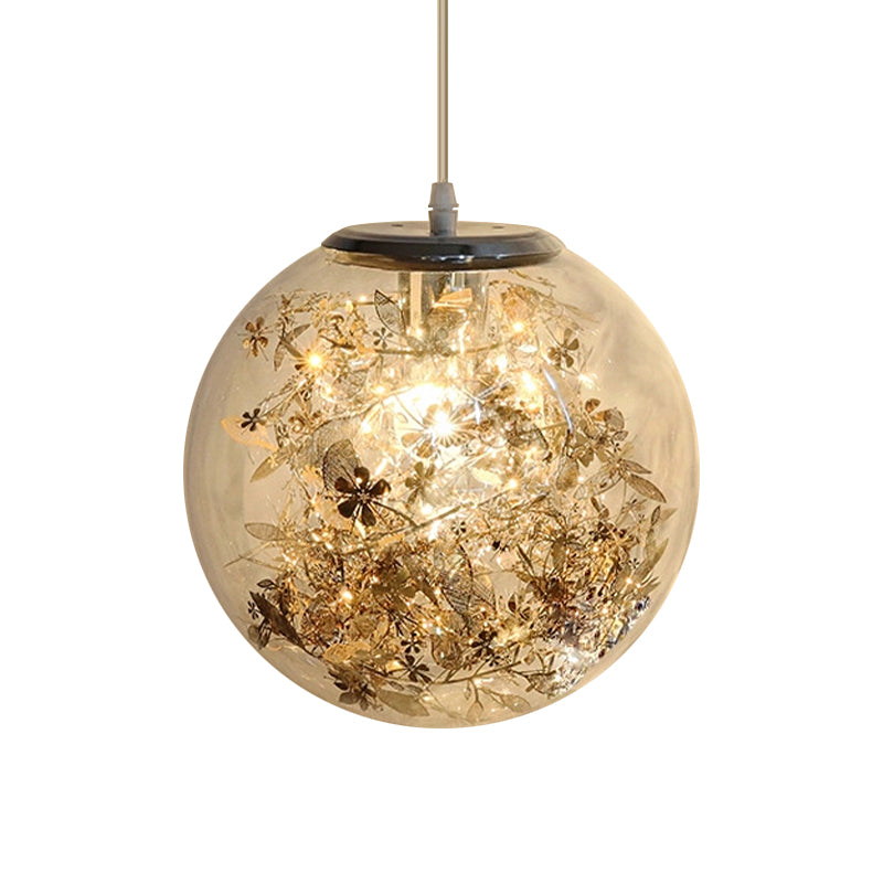 Globe Clear Glass Pendulum Light Modern 1 Head Silver/Gold Ceiling Hang Lamp with Scattered Flower Decor Clearhalo 'Ceiling Lights' 'Glass shade' 'Glass' 'Modern Pendants' 'Modern' 'Pendant Lights' 'Pendants' Lighting' 1937441