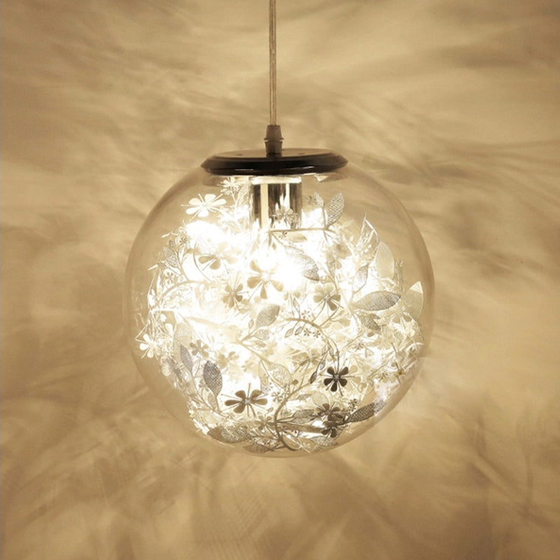 Globe Clear Glass Pendulum Light Modern 1 Head Silver/Gold Ceiling Hang Lamp with Scattered Flower Decor Silver B Clearhalo 'Ceiling Lights' 'Glass shade' 'Glass' 'Modern Pendants' 'Modern' 'Pendant Lights' 'Pendants' Lighting' 1937443