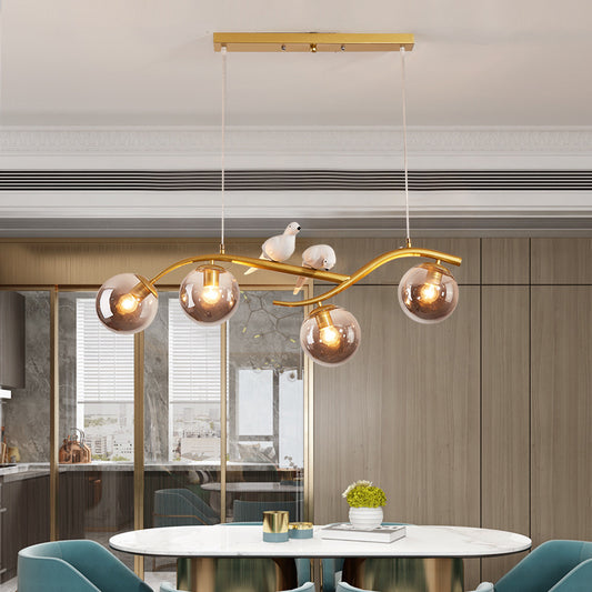Metal Branch Hanging Lamp Contemporary 4-Light Black/Gold Island Pendant with Bird Deco and Smoke Grey/Cognac Glass Shade Clearhalo 'Ceiling Lights' 'Glass shade' 'Glass' 'Island Lights' Lighting' 1937738