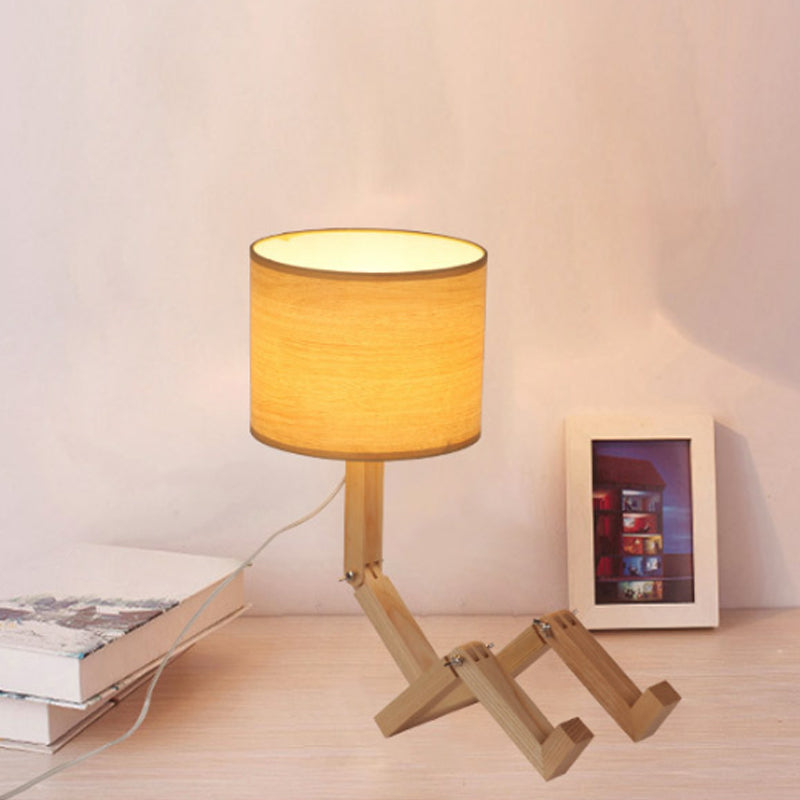 Man-Shaped Table Lamp Novelty Modern Wood Single Beige/Black/White Night Light with Book Rack Design and Cylinder Fabric Shade Clearhalo 'Lamps' 'Table Lamps' Lighting' 1949329