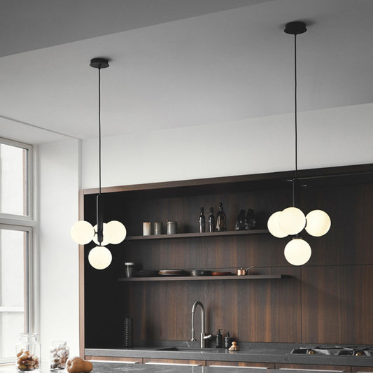 Orb Shaped Bar Ceiling Pendant Ivory Glass 4 Heads Simple Style Chandelier Light in Black Clearhalo 'Ceiling Lights' 'Chandeliers' 'Modern Chandeliers' 'Modern' Lighting' 1949707