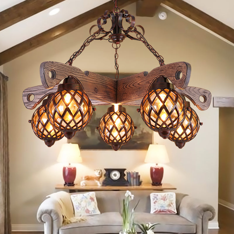 Country Style Globe Chandelier with Amber Glass Adjustable 3/5 Heads Hanging Pendant Light in Black Clearhalo 'Ceiling Lights' 'Chandeliers' 'Glass shade' 'Glass' 'Industrial Chandeliers' 'Industrial' 'Middle Century Chandeliers' 'Tiffany' Lighting' 1950132