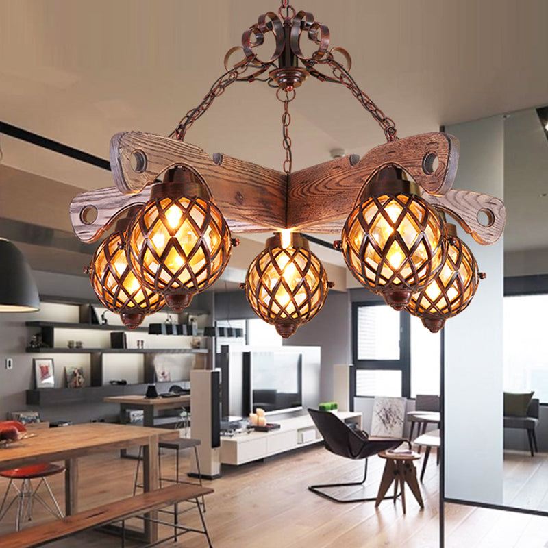 Country Style Globe Chandelier with Amber Glass Adjustable 3/5 Heads Hanging Pendant Light in Black Clearhalo 'Ceiling Lights' 'Chandeliers' 'Glass shade' 'Glass' 'Industrial Chandeliers' 'Industrial' 'Middle Century Chandeliers' 'Tiffany' Lighting' 1950133