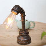 1 Light Iron Table Lamp Rustic Style Antique Bronze Exposed Bulb Bedroom Table Lighting with Pipe Design Antique Bronze Clearhalo 'Lamps' 'Table Lamps' Lighting' 195675