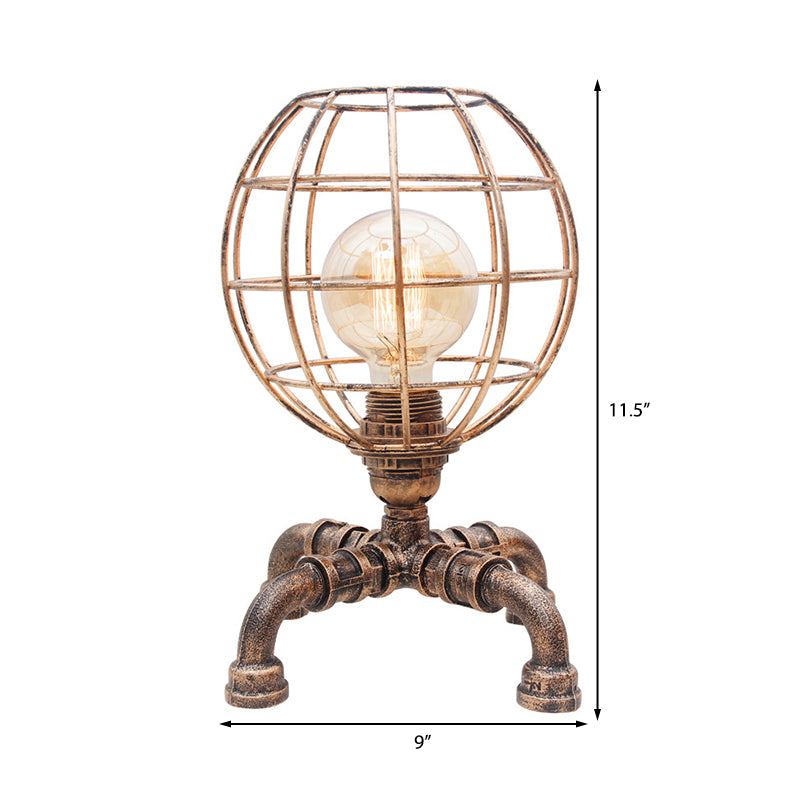 Metal Ball Cage Table Lamp with Pipe-Like Base Industrial Style 1 Bulb Bedroom Mini Table Light in Antique Bronze Clearhalo 'Lamps' 'Table Lamps' Lighting' 195916