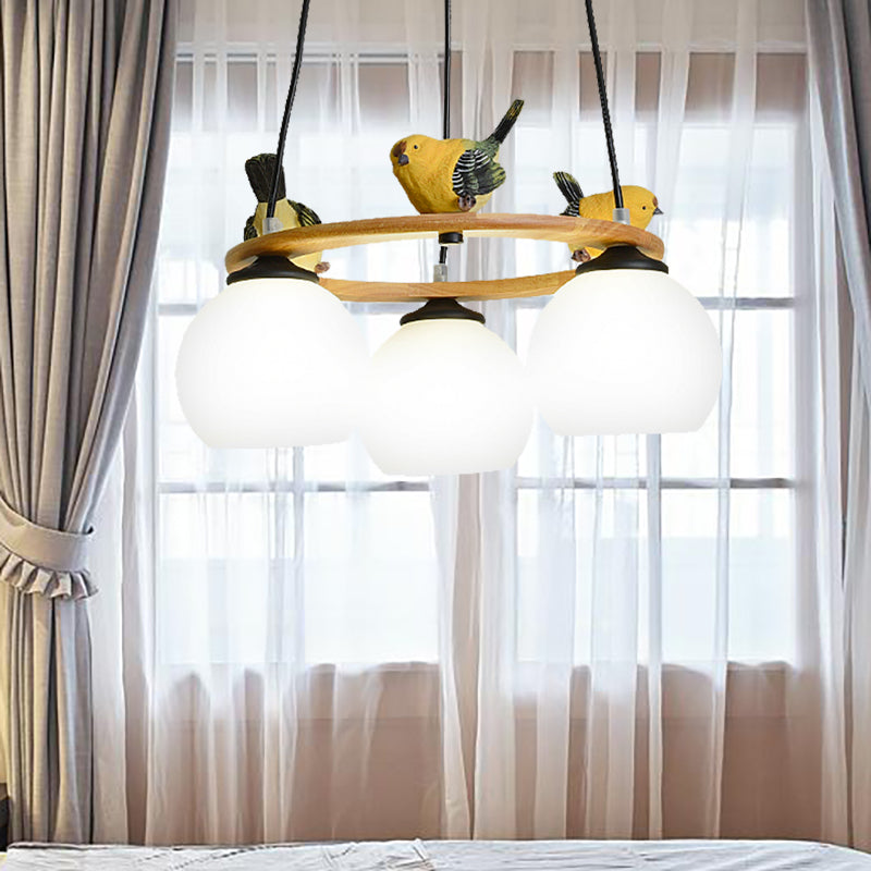 Modern Design Globe Chandelier Lighting Glass Shade Yellow Chandelier with Bird for Living Room Clearhalo 'Ceiling Lights' 'Chandeliers' Lighting' options 196687