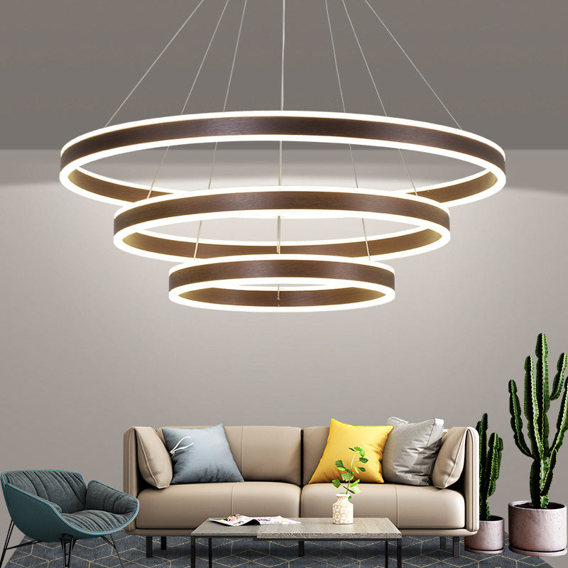 Minimalistic LED Ceiling Hang Lamp Black/Gold/Coffee 3 Tiered Circle Chandelier with Acrylic Shade Clearhalo 'Ceiling Lights' 'Chandeliers' 'Modern Chandeliers' 'Modern' Lighting' 1970182