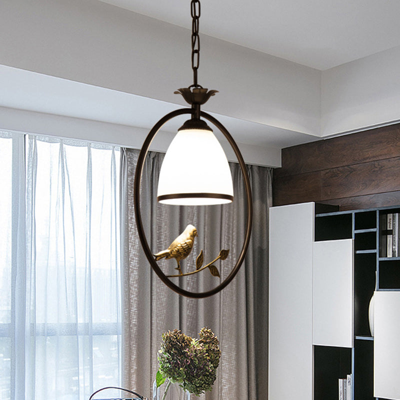 Rustic Oval/Round Pendulum Light 1 Bulb Metal Pendant Lamp in Black with Bell White Glass Shade and Bird Decoration Clearhalo 'Ceiling Lights' 'Pendant Lights' 'Pendants' Lighting' 1972269