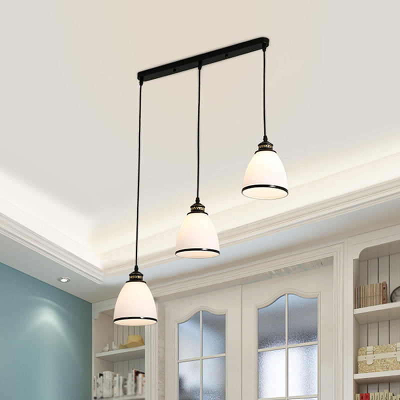 Minimalist Bell Cluster Pendant 3 Lights Ivory Glass Hanging Lamp with Round/Linear Canopy in Black Clearhalo 'Ceiling Lights' 'Close To Ceiling Lights' 'Glass shade' 'Glass' 'Pendant Lights' 'Pendants' Lighting' 1972273
