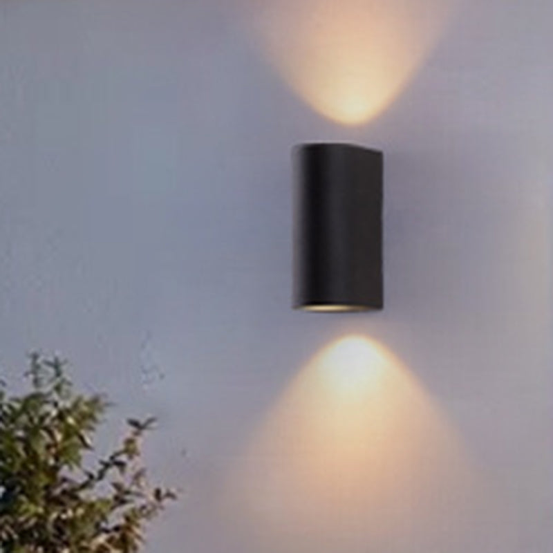 Black Small/Large Cylinder Wall Light Minimalist Aluminum LED Flush Wall Sconce for Outdoor Clearhalo 'Cast Iron' 'Glass' 'Industrial' 'Modern wall lights' 'Modern' 'Tiffany' 'Traditional wall lights' 'Wall Lamps & Sconces' 'Wall Lights' Lighting' 1985443