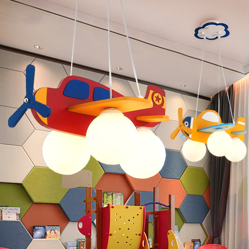 Kid Bedroom Plane Hanging Light with Opal Glass Ball Shade Cartoon 3 Heads Hanging Pendant Light in Blue/Yellow Clearhalo 'Ceiling Lights' 'Chandeliers' Lighting' options 200450