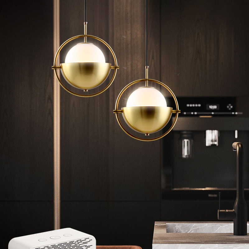 Brass Orb Pendant Lighting Contemporary 1-Light Opal Glass Hanging Lamp Kit with Metal Frame Brass Clearhalo 'Ceiling Lights' 'Modern Pendants' 'Modern' 'Pendant Lights' 'Pendants' Lighting' 2011707