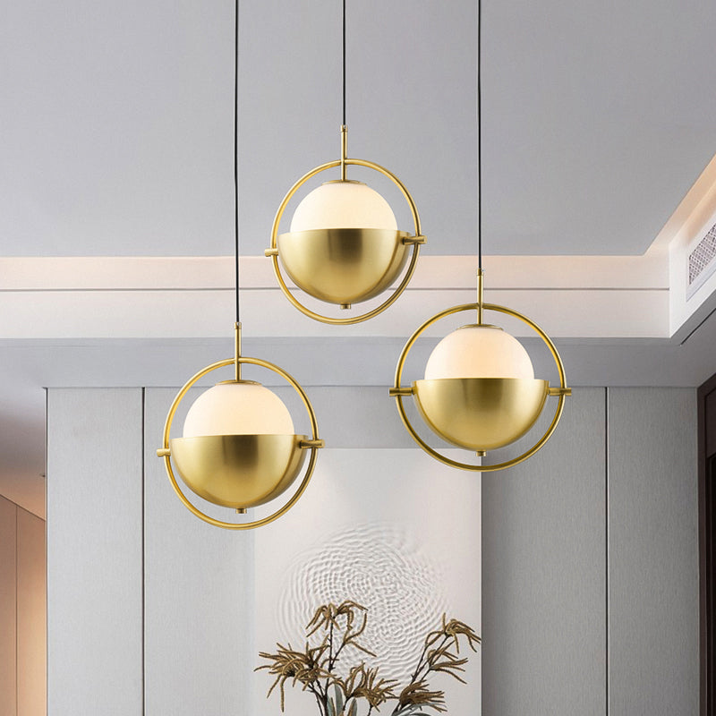 Brass Orb Pendant Lighting Contemporary 1-Light Opal Glass Hanging Lamp Kit with Metal Frame Clearhalo 'Ceiling Lights' 'Modern Pendants' 'Modern' 'Pendant Lights' 'Pendants' Lighting' 2011708
