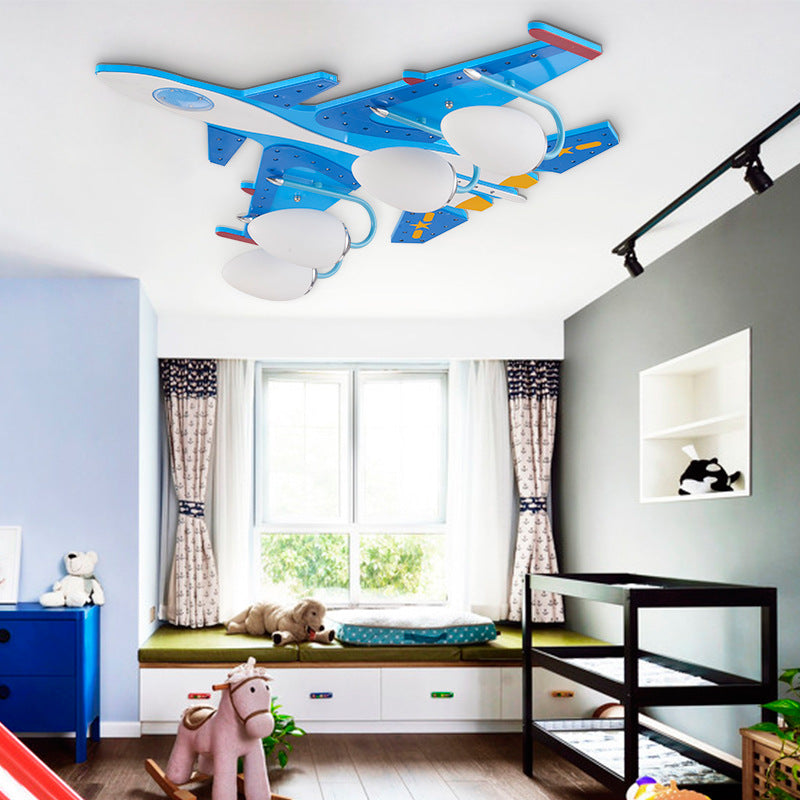 Kids Fighter Aircraft Flush Ceiling Light Glass Wood Blue LED Ceiling Lamp for Amusement Park Clearhalo 'Ceiling Lights' 'Chandeliers' 'Close To Ceiling Lights' 'Close to ceiling' 'Glass shade' 'Glass' Lighting' 201801