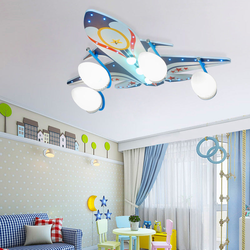Modern Cool Blue Ceiling Mount Light Fighter Aircraft 4 Lights Wood Ceiling Lamp for Baby Room Clearhalo 'Ceiling Lights' 'Close To Ceiling Lights' 'Close to ceiling' 'Glass shade' 'Glass' Lighting' 201806